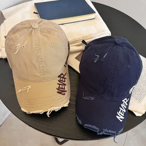 Gorras de béisbol vintage en caqui y marino con bordado 'NEVER' y efecto desgastado