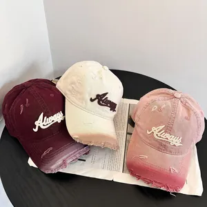 Distressed vintage baseball caps with Always embroidery in wine red and cream colors