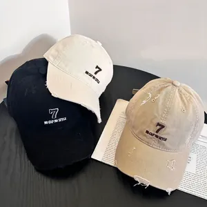 Distressed denim baseball cap with vintage embroidery available in black, beige and khaki