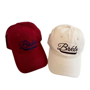 Retro baseball caps in red and beige with Brkln embroidery for a small face look