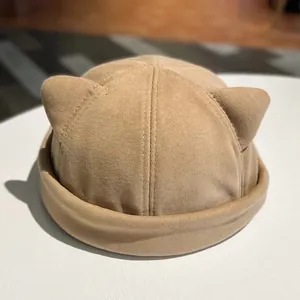 Cute khaki beanie with cat ear design in a knit texture and rolled brim style