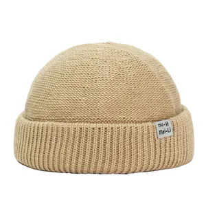 Berretto docker kaki minimalista da uomo con trama in maglia spessa ed etichetta tessuta