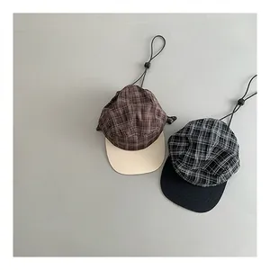 Retro plaid flat brim baseball cap with adjustable drawstring in two stylish colorways