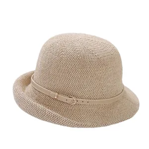 Beige woven sun hat for women with thin leather belt and gold buckle accent