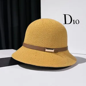 Classic mustard yellow knitted cloche hat with leather strap and gold buckle detail