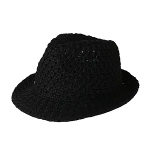 Women's black hollow crochet sun hat with breathable wide brim for UV protection