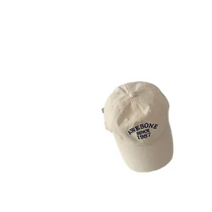 Cream vintage baseball cap with Awesome Since 1987 embroidery and wide brim style
