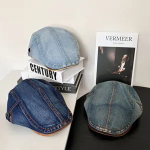 Vintage Newsboy-Mützen aus gewaschenem Denim in Blau-Tönen mit Kontrastnähten für Damen