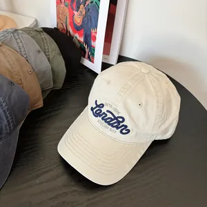 Detail shot of the 3D London letter embroidery on a washed cotton baseball cap brim