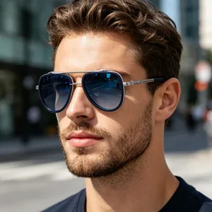 Close-up of male model wearing pilot sunglasses with blue gradient lenses and double bridge