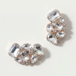 Elegant crystal cluster stud earrings featuring mixed stone cuts and rose gold plating