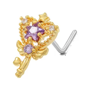 L-shaped gold nose stud with star wand and purple crystal design for piercings
