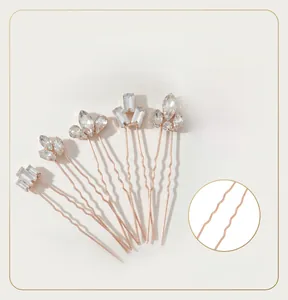 Detailed close-up of 5pcs geometric crystal hair pins with rose gold wavy U-shaped sticks