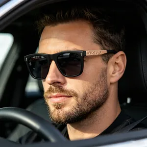 Detailed view of square polarized sunglasses with engraved rose gold metal temples on model