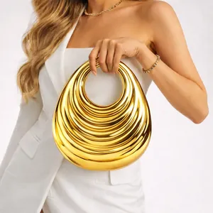 Chic gold acrylic evening handbag with a concentric wave design and circular handle