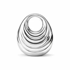 Detailed view of silver polished egg-shaped acrylic handbag with ripple texture and top handle