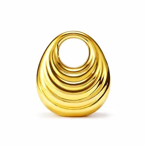 Chic gold acrylic evening handbag with concentric circular ripple texture and mirror finish