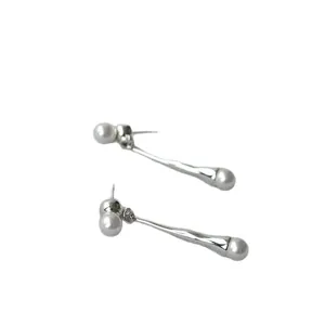Minimalist silver long teardrop earrings with white pearls and textured metal design