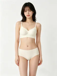Close-up of seamless wireless bra set with jelly-strip support in off-white fabric