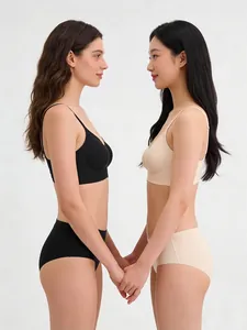 Seamless wireless bra and panties set in black and beige with soft jelly strip support