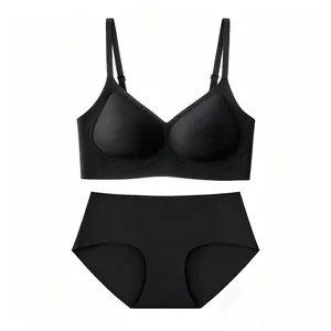 Detail of black seamless wire-free lingerie set with thin adjustable straps and soft fabric