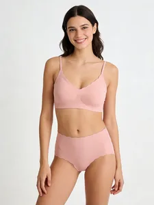Dettagli del set lingerie senza cuciture con bordi a conchiglia color rosa cipria