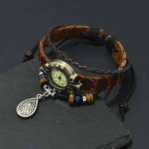 Vintage brown leather punk watch bracelet with bronze dial and beads on stone base