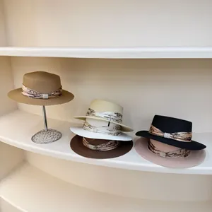 Flat top straw sun hats in six colors with vintage ribbons and pearl buckle accents