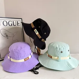 Waterproof wide brim sun hats for women with windproof strings in black green and purple