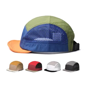 Detail of multi-color five-panel camping hat with breathable mesh side and adjustable strap