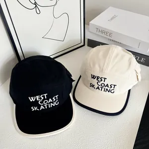 Black and beige 5-panel short brim baseball caps with West Coast Skating embroidery