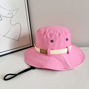 Pink wide brim sun hat for women with waterproof fabric and adjustable windproof strap