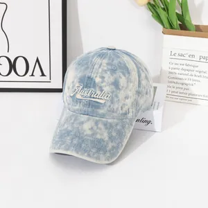 Casquette de baseball en jean tie-dye avec broderie Australia sur livres blancs