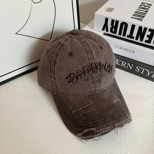 Close-up of vintage distressed baseball cap featuring 1978 embroidery and frayed brim