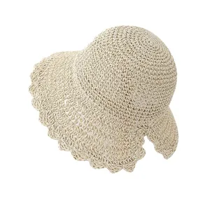 Handmade foldable straw sun hat with wavy brim for women beach summer vacations