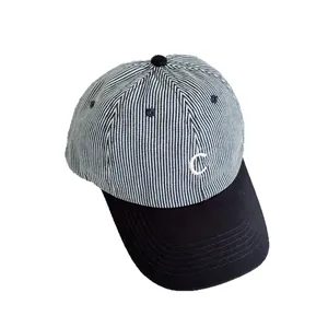 Blue and white striped baseball cap with C embroidery and black brim for women