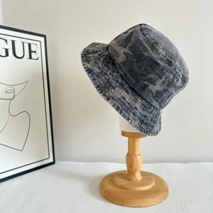Vintage dark gray camouflage bucket hat for outdoor exploration and sun protection