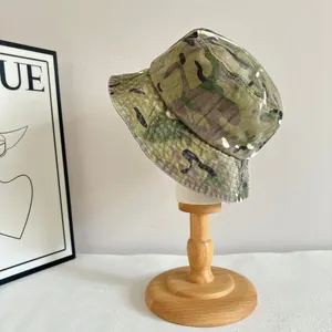 Detailed texture of camouflage sun hat on wooden stand for outdoor adventure