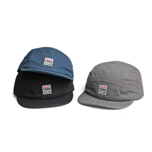 Retro contrast color baseball caps in navy, black and grey with woven patch embroidery