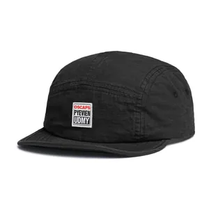 Close-up of black ripstop camper hat with woven OSCAPS label on white background
