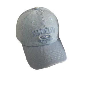 Light blue washed denim baseball cap featuring Brooklyn embroidery on the front