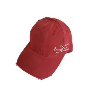 Distressed dark red baseball cap with side letter embroidery and breathable fabric