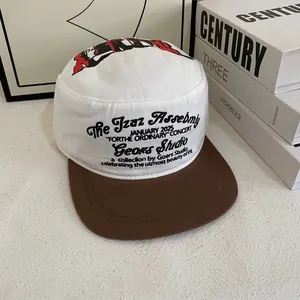 Flat top military cap with white letter print crown and contrast brown brim