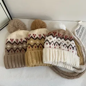 Winter Fair Isle knit hats with pom-poms and ear flaps in coffee, yellow and beige