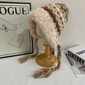 Chapeau de trappeur en maille épaisse avec motifs ethniques et doublure en polaire chaude