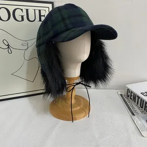 Plaid trapper baseball cap with green checkered wool and black faux fur earflaps