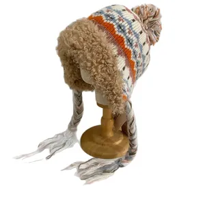 Bonnet aviateur en tricot nordique avec doublure pelucheuse et glands pour l'hiver
