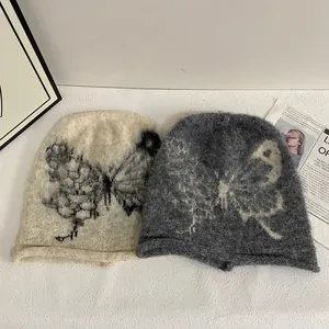 Japanese butterfly embroidered knit beanie with warm ear protection in grey and cream