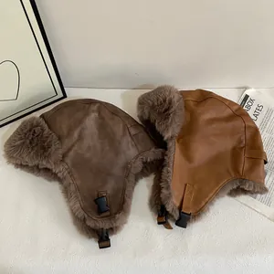 Brown and khaki PU leather trapper hats with thick plush lining for winter warmth
