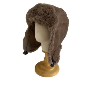 Winter brown PU leather trapper hat with warm faux fur lining and adjustable ear flaps